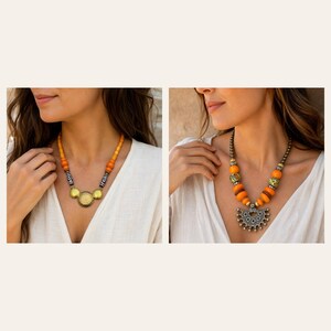 May include: Two necklaces featuring orange beads. The left necklace has black and white patterned spacers and a central gold-toned circular pendant. The right necklace includes green patterned beads and a large, silver-toned semi-circular pendant.