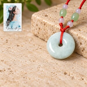 Peace Circle Green Cord Necklace shown in a close macro view highlighting the visible texture, texture and construction details. A personalized digital greeting card is shown alongside.