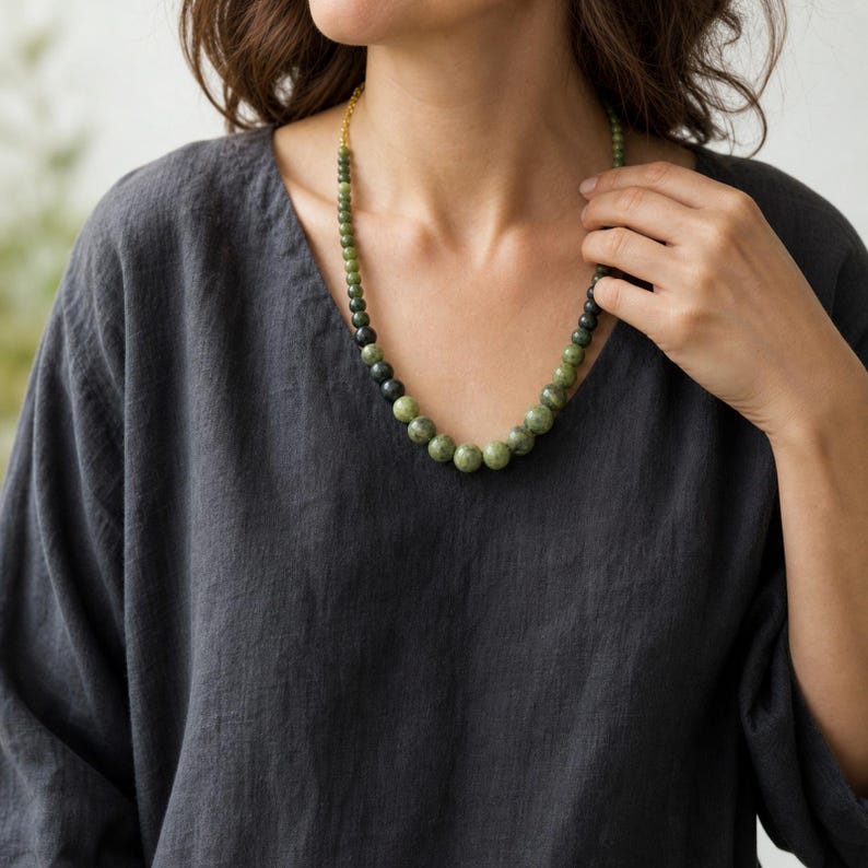 Three-piece handmade necklace set featuring gray and brown beaded necklace, brown and gray beaded necklace and gray and brown beaded necklace, displayed together to show the coordinated colors and beadwork