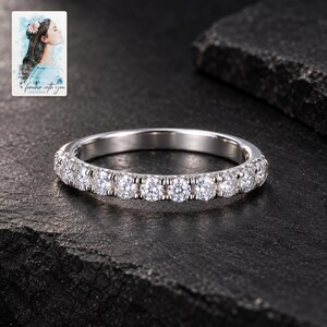 Moissanite Half Eternity Ring, shown against a dark background. A sample personalized digital greeting card is shown alongside.