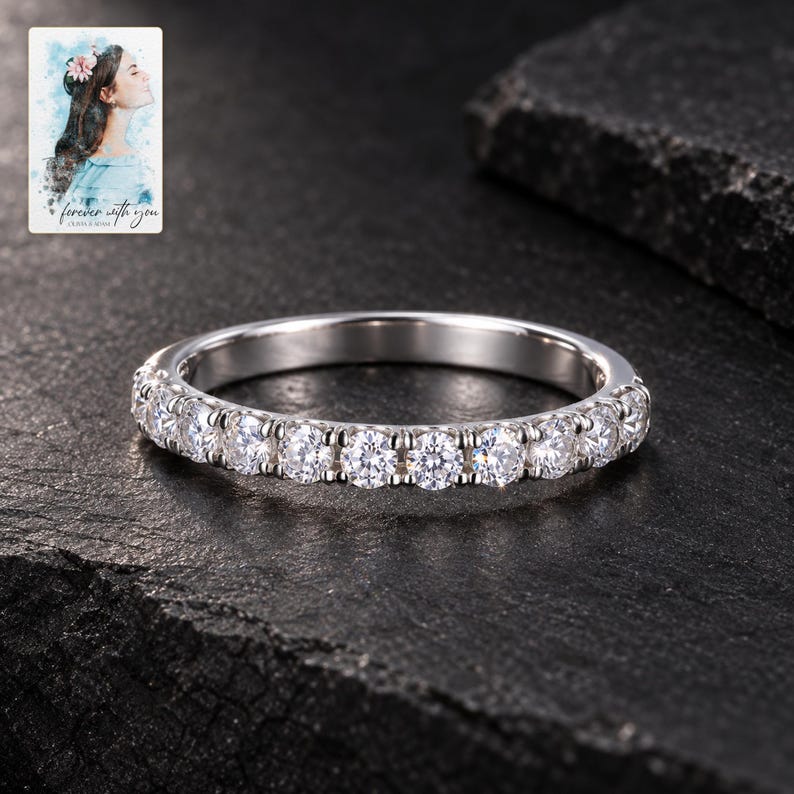 Moissanite Half Eternity Ring, shown against a dark background. A sample personalized digital greeting card is shown alongside.