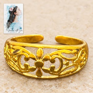 Golden Bloom Filigree Ring shown as the main Etsy hero photograph with a clear view of the complete design. A personalized digital greeting card is shown alongside.