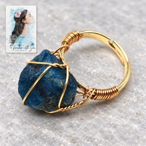 Blue Wire Wrapped Ring, macro detail view. A personalized digital greeting card is shown alongside.