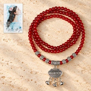 Crimson Agate style Charm Wrap Bracelet shown as the main Etsy hero photograph with a clear view of the complete design. A personalized digital greeting card is shown alongside.