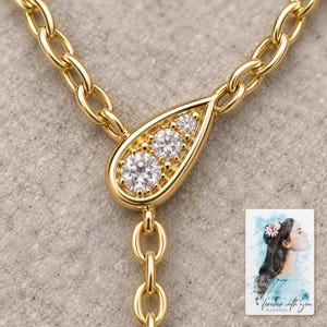 Moissanite Y Necklace, macro detail view. A personalized digital greeting card is shown alongside.