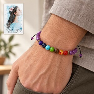 Violet Spectrum Cord Bracelet worn by an adult in a natural daytime lifestyle scene. A personalized digital greeting card is shown alongside.