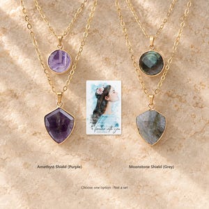 Layered Shield Necklace, variation comparison view. A personalized digital greeting card is shown alongside.