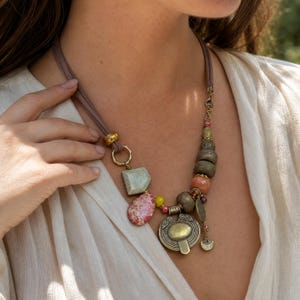 Gray and Beige Statement Beaded Necklace, Boho Handmade Jewelry, Artisan Gift for Her displayed on a jewelry bust with the layered beadwork and pendants visible