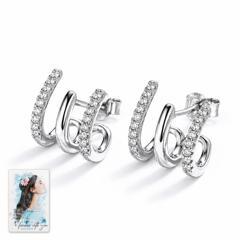 Triple Arc Stud Earrings, shown against a light background. A sample personalized digital greeting card is shown alongside.