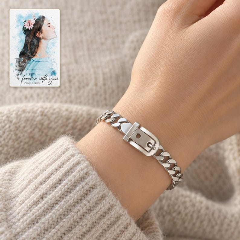 Adult woman's wrist wearing the silver tone belt buckle bracelet with an oatmeal knit sleeve. A personalized digital greeting card is shown alongside.
