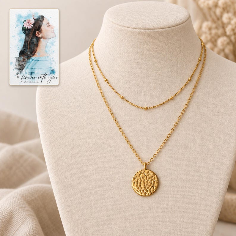 Gold Tone Coin Satellite Necklace shown in a close macro view highlighting the visible, texture and construction details. A personalized digital greeting card is shown alongside.