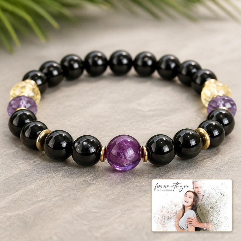 Violet Dusk Bead Bracelet shown during a warm gift-receiving moment between adults with the exact jewelry visible.