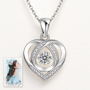 Moissanite Heart Necklace, catalog view. A personalized digital greeting card is shown alongside.