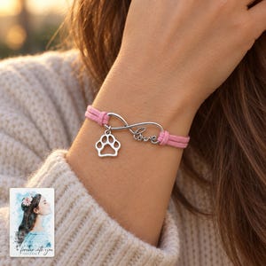 Infinity Love Paw Bracelet, worn with evening clothing. A sample personalized digital greeting card is shown alongside.