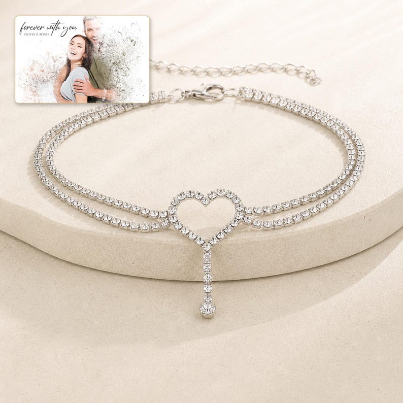 Lovelight Crystal Heart Anklet photographed in warm natural window light in an elegant home setting.