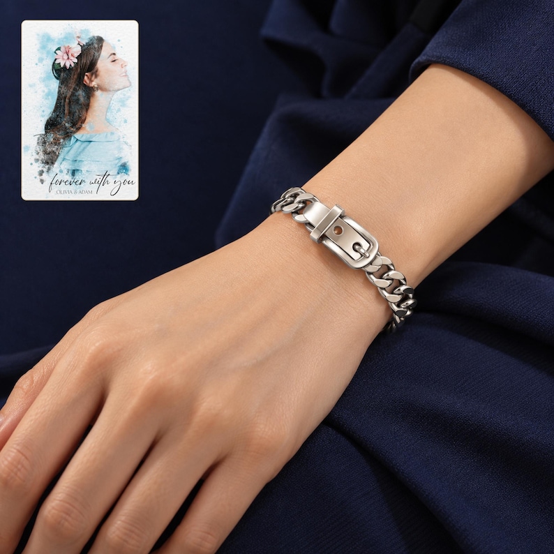 Adult woman's wrist wearing the polished silver tone curb-chain bracelet against navy clothing. A personalized digital greeting card is shown alongside.