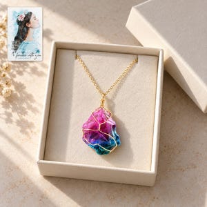 Rainbow Stone Necklace, displayed in a presentation box. A sample personalized digital greeting card is shown alongside.