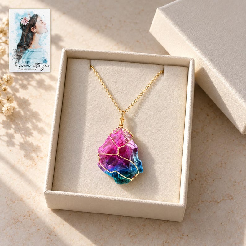 Rainbow Stone Necklace, displayed in a presentation box. A sample personalized digital greeting card is shown alongside.