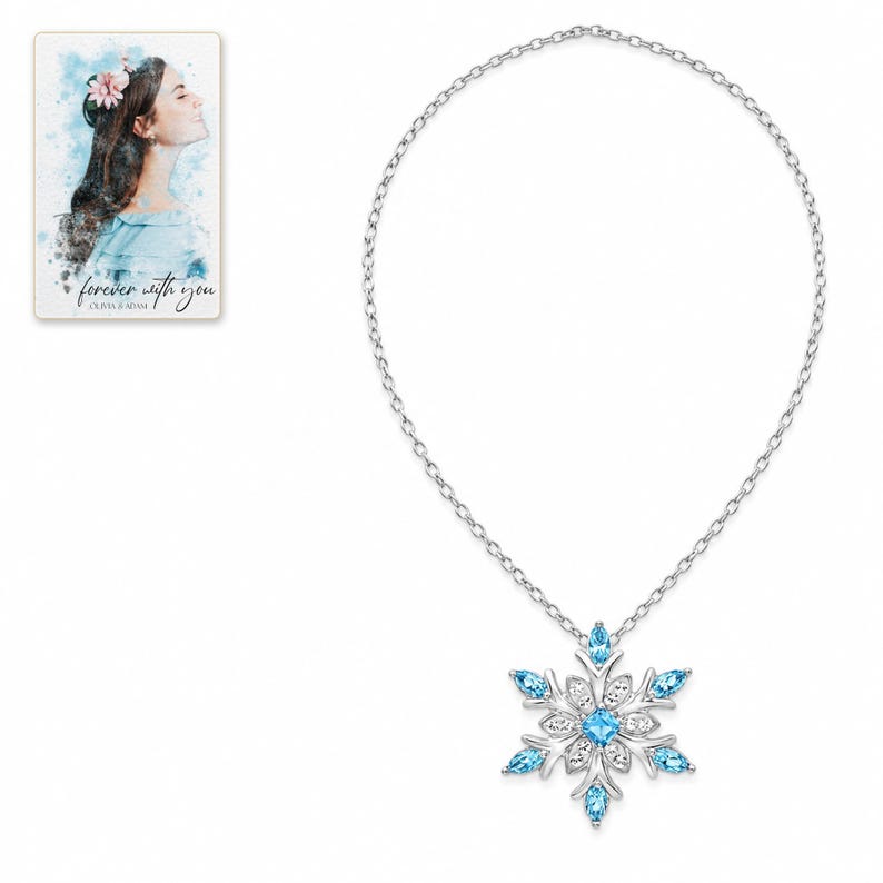 Winter Azure Snowflake Necklace shown on a clean white catalog background for an unobstructed product view. A personalized digital greeting card is shown alongside.
