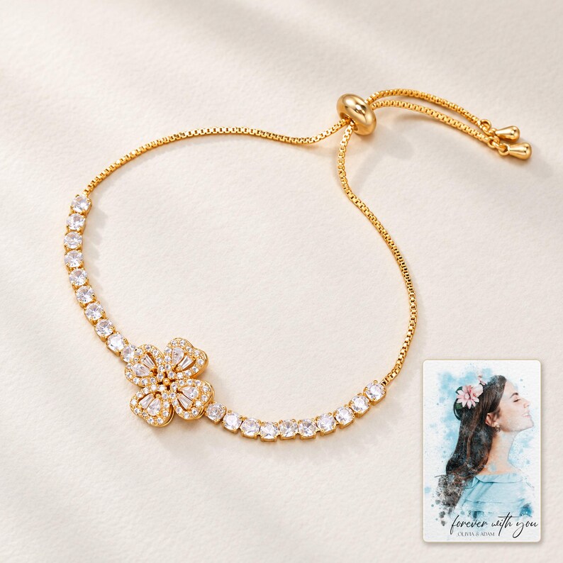 Golden Petal Slider Bracelet shown on a clean white catalog background for an unobstructed product view. A personalized digital greeting card is shown alongside.
