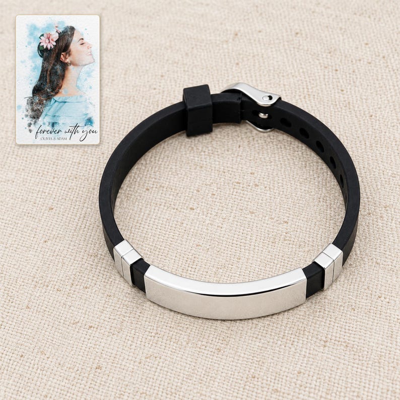 Black adjustable strap bracelet with a plain curved bar arranged on oatmeal linen. A personalized digital greeting card is shown alongside.