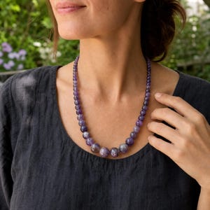 Three-piece handmade necklace set featuring gray and brown beaded necklace, gray and brown beaded necklace and brown and gray beaded necklace, displayed together to show the coordinated colors and beadwork
