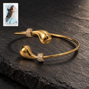 Gold Tone Cuff Bracelet, shown against a dark background. A sample personalized digital greeting card is shown alongside.