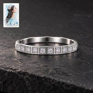 Moissanite Band Ring, shown against a dark background. A sample personalized digital greeting card is shown alongside.
