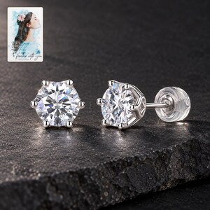 Moissanite Stud Earrings, shown against a dark background. A sample personalized digital greeting card is shown alongside.