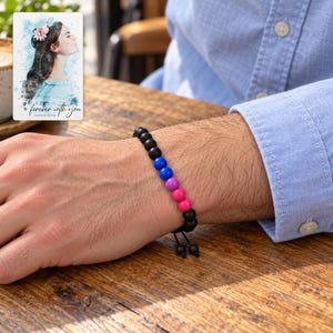 Black Bead Bracelet, human lifestyle view. A personalized digital greeting card is shown alongside.