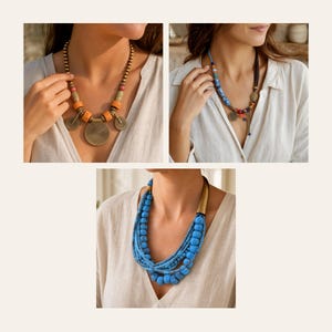 May include: A collection of three necklaces featuring diverse designs. One necklace has brass beads and circular pendants, another uses blue and red patterned beads with dark cord, and the third is a multi-strand necklace with bright blue beads.