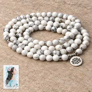 White Bead Wrap Bracelet, shown on a display surface. A sample personalized digital greeting card is shown alongside.