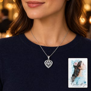 Moissanite Heart Necklace, human lifestyle view. A personalized digital greeting card is shown alongside.