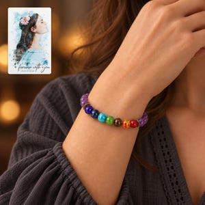 Violet Spectrum Cord Bracelet worn by an adult in a polished evening lifestyle scene. A personalized digital greeting card is shown alongside.