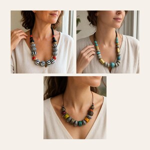 May include: A collection of three necklaces featuring various bead designs. One necklace has black and white striped beads with red accents, another has turquoise and gold-toned beads, and the third features multi-colored textured beads.