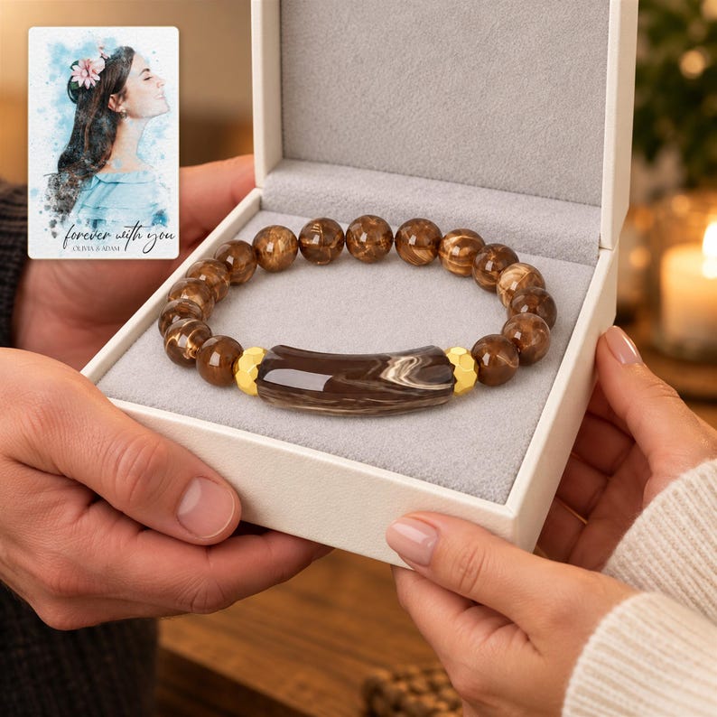 Cocoa Swirl Bar Bracelet shown during a warm gift-receiving moment between adults with the jewelry visible. A personalized digital greeting card is shown alongside.