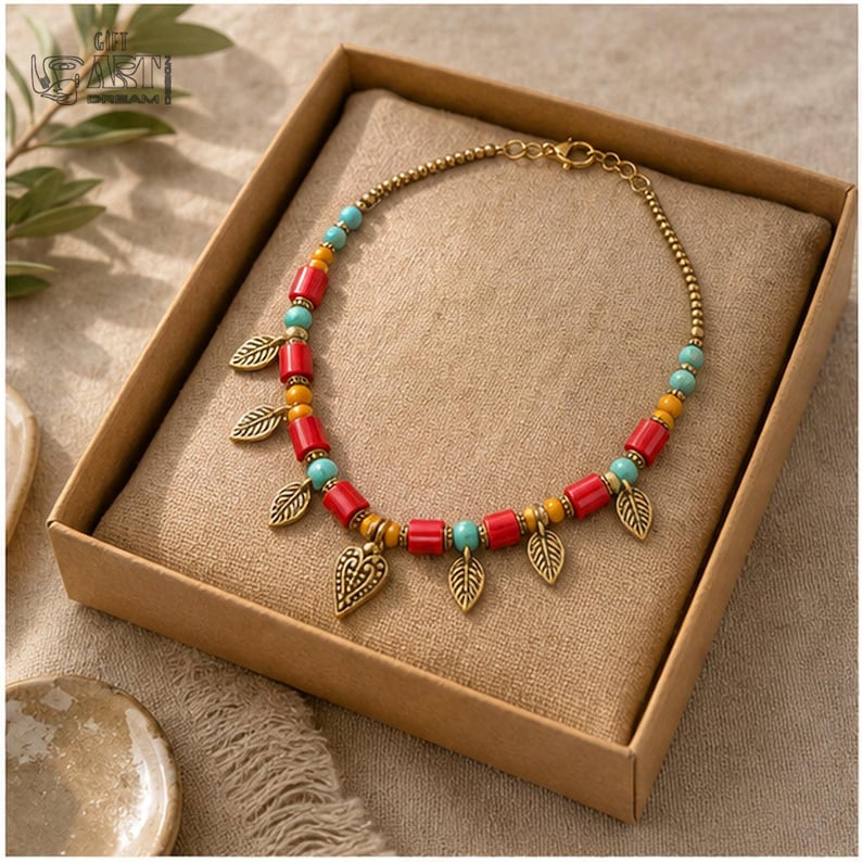 Colorful Beaded Heart Charm Necklace, Boho Handmade Jewelry Gift for Her shown as a clean lifestyle flatlay with the full necklace shape and handmade bead details