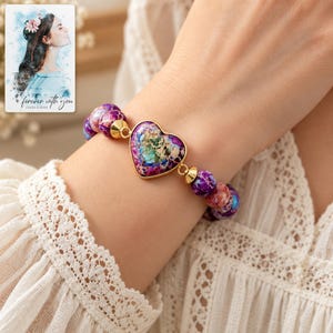 Imperial Mosaic Heart Bracelet worn by an adult model for styling and everyday styling. A personalized digital greeting card is shown alongside.