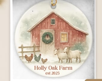 May include: A ceramic ornament featuring a watercolor painting of a red barn with a green wreath, sheep, and chickens. The text "Holly Oak Farm est 2025" is below the image. The ornament is round and has a gold string for hanging.