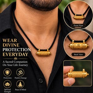 May include: A gold-toned cylindrical pendant featuring a textured, cross-hatched surface and a central Om symbol on the reverse side. The pendant is suspended from a black braided cord necklace, shown in multiple views including front and back.