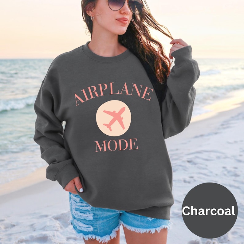 Airplane Mode Sweatshirt | Airplane Shirt | Travel Sweater | Gift for Traveler | Airplane Mode | Vacation Shirt | Vacay Mode Crewneck
Model is wearing an oversized fit in Charcoal. Various colors and sizes available. Perfect cozy sweatshirt for anyone in vacay mode, or gift for a traveler.