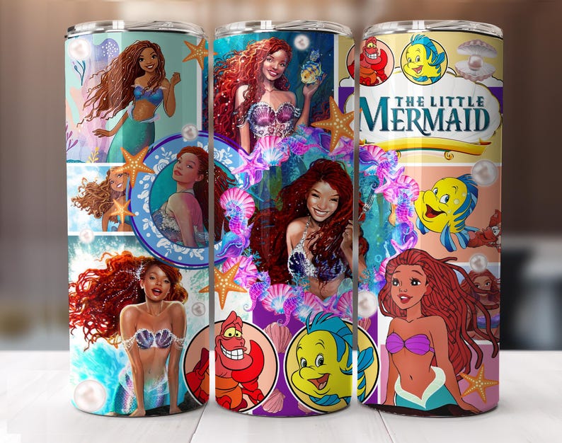 May include: A stainless steel tumbler with a colorful design featuring characters from The Little Mermaid. The design includes Ariel, Flounder, Sebastian, and Ursula. The tumbler has a black lid and a straw.