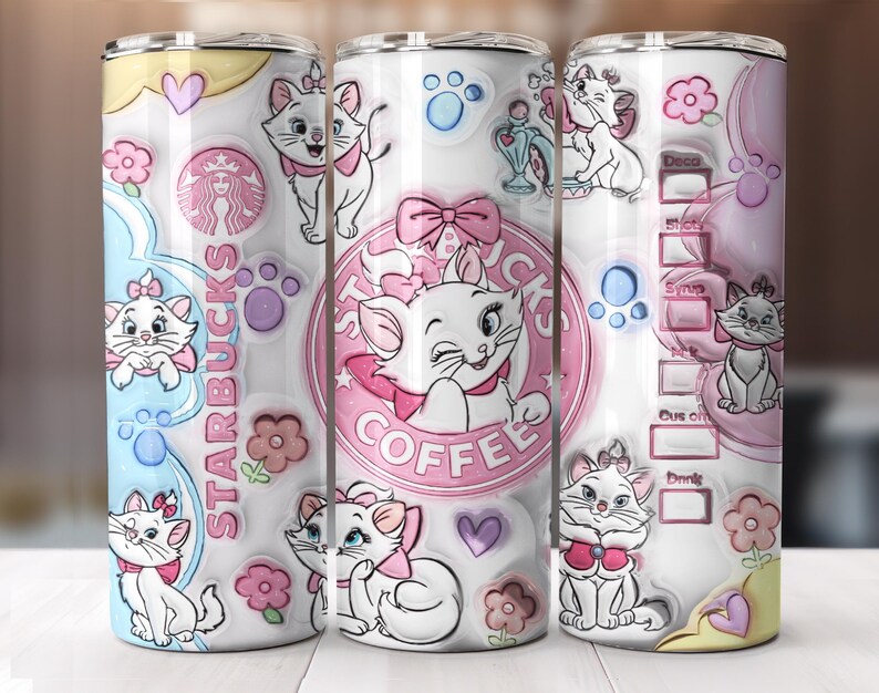 May include: A set of three white stainless steel tumblers featuring a design with a pink Starbucks logo and cartoon images of a white cat with a pink bow. The tumblers have a white background with pink and blue accents.
