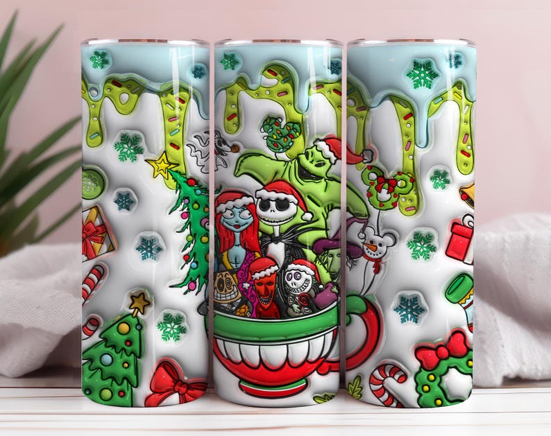 May include: A white tumbler with a festive design featuring characters from The Nightmare Before Christmas and The Grinch. The design includes a Christmas tree, snowflakes, and a red and green cup. The top has a light blue dripping effect.