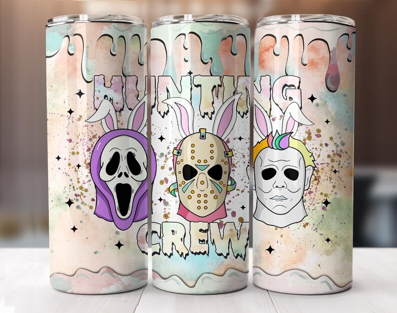 May include: Three stainless steel tumblers with a colorful design. Each tumbler features a horror movie character with bunny ears and the words "HUNTING CREW". The background has pastel colors and star accents.