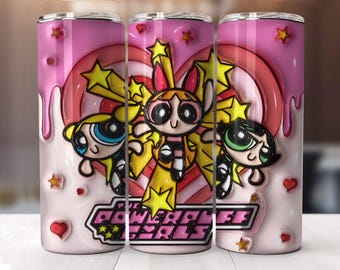 May include: A pink tumbler featuring the Powerpuff Girls. The design includes the characters Blossom, Bubbles, and Buttercup, with a heart and star motif. The words "The Powerpuff Girls" are displayed in a white and black font.