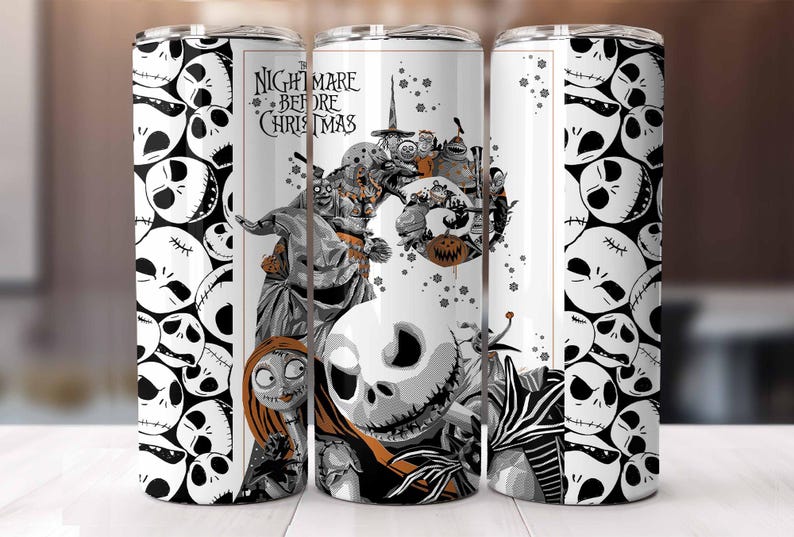 May include: A white tumbler featuring characters and imagery from "The Nightmare Before Christmas." The design includes Jack Skellington, Sally, and other characters in a black, white, and orange color scheme. The tumbler has a repeating pattern of Jack Skellington's face.