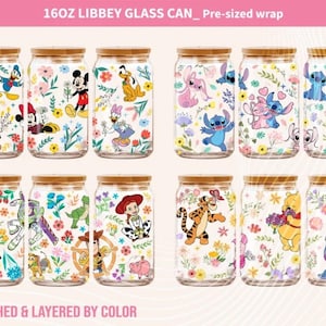 May include: Nine 16oz glass jars with lids, each featuring a different Disney character design. The jars are decorated with floral patterns and feature characters like Mickey Mouse, Stitch, and Winnie the Pooh. The text "16OZ LIBBEY GLASS CAN_ Pre-sized wrap" is at the top of the image. The text "ATTACHED & LAYERED BY COLOR" is at the bottom of the image.