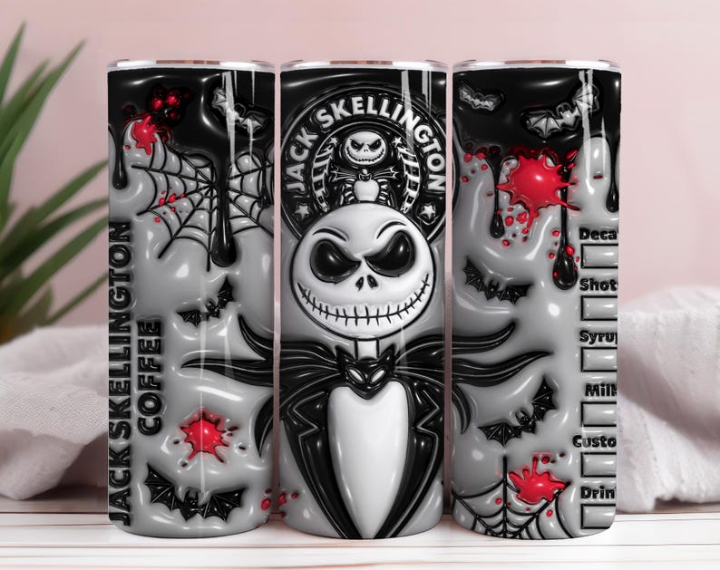 May include: A cylindrical tumbler featuring a design inspired by Jack Skellington. The tumbler has a black and white color scheme with accents of red. The design includes bats, spiderwebs, and the text "Jack Skellington Coffee".