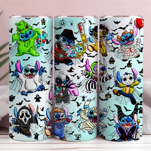 May include: Three stainless steel tumblers with a light blue background, featuring cartoon characters dressed as Halloween villains. The designs include Stitch as various characters, surrounded by bats, spiderwebs, and other spooky elements.